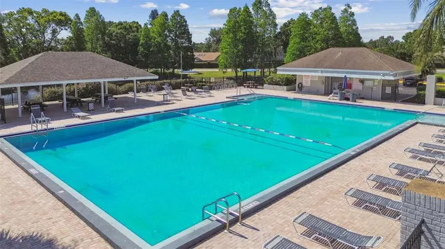 a view of a lake with a building in the background