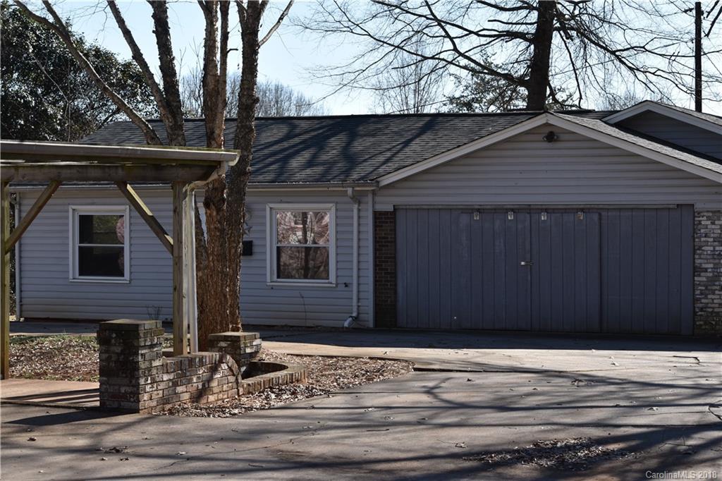 631 Island Ford Road Statesville, NC 28625 - Photo 3 of 6 a house with trees in the background