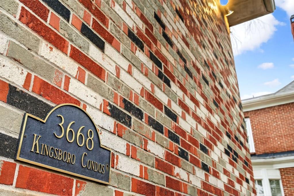 3668 Kingsboro Road Northeast, Unit 10 Atlanta, GA 30319 - Photo 12 of 43 a street sign on a pole