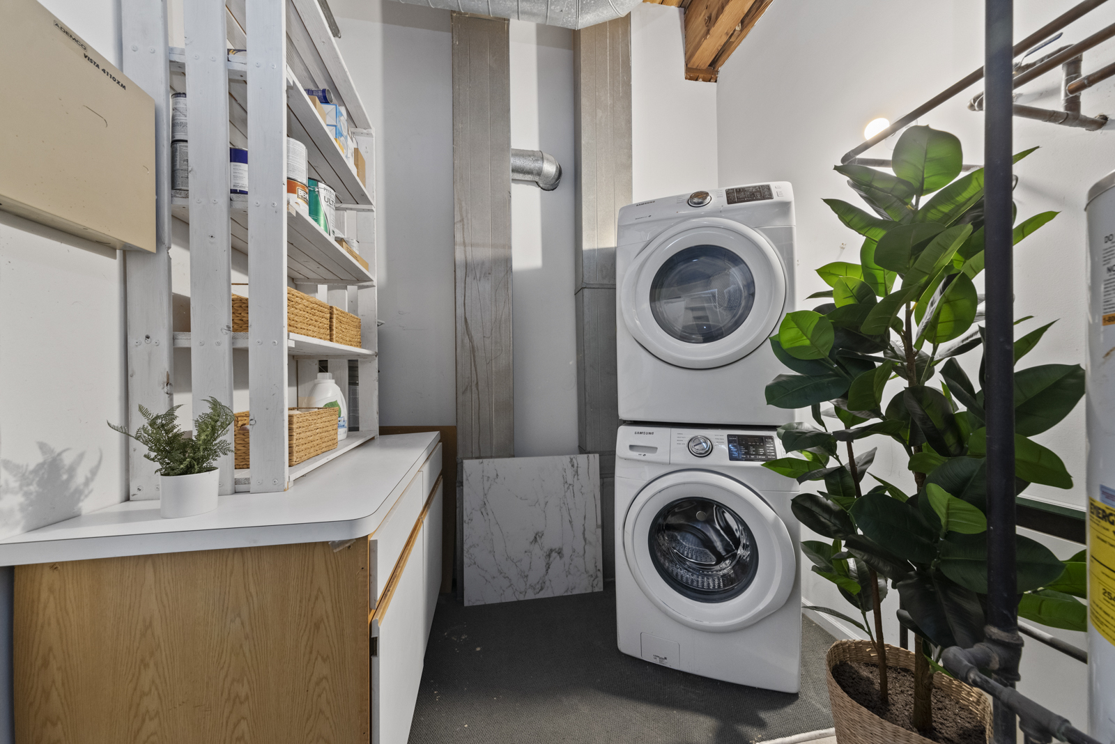 1017 West Washington Boulevard, Unit 5B Chicago, IL 60607 - Photo 12 of 13 a utility room with sink a washer and dryer