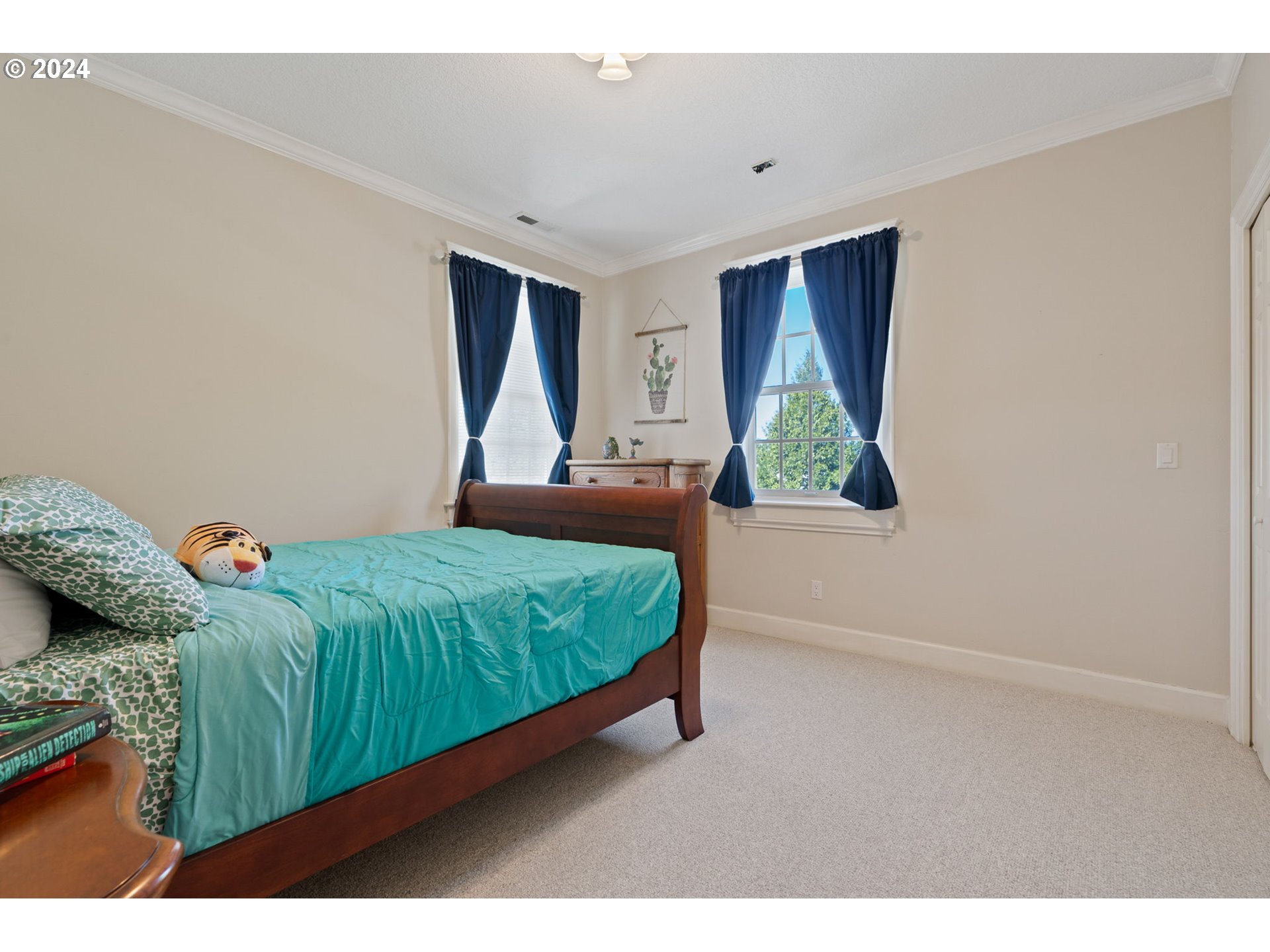 10695 South Bremer Road Canby, OR 97013 - Photo 17 of 44 a bedroom with a bed and a window