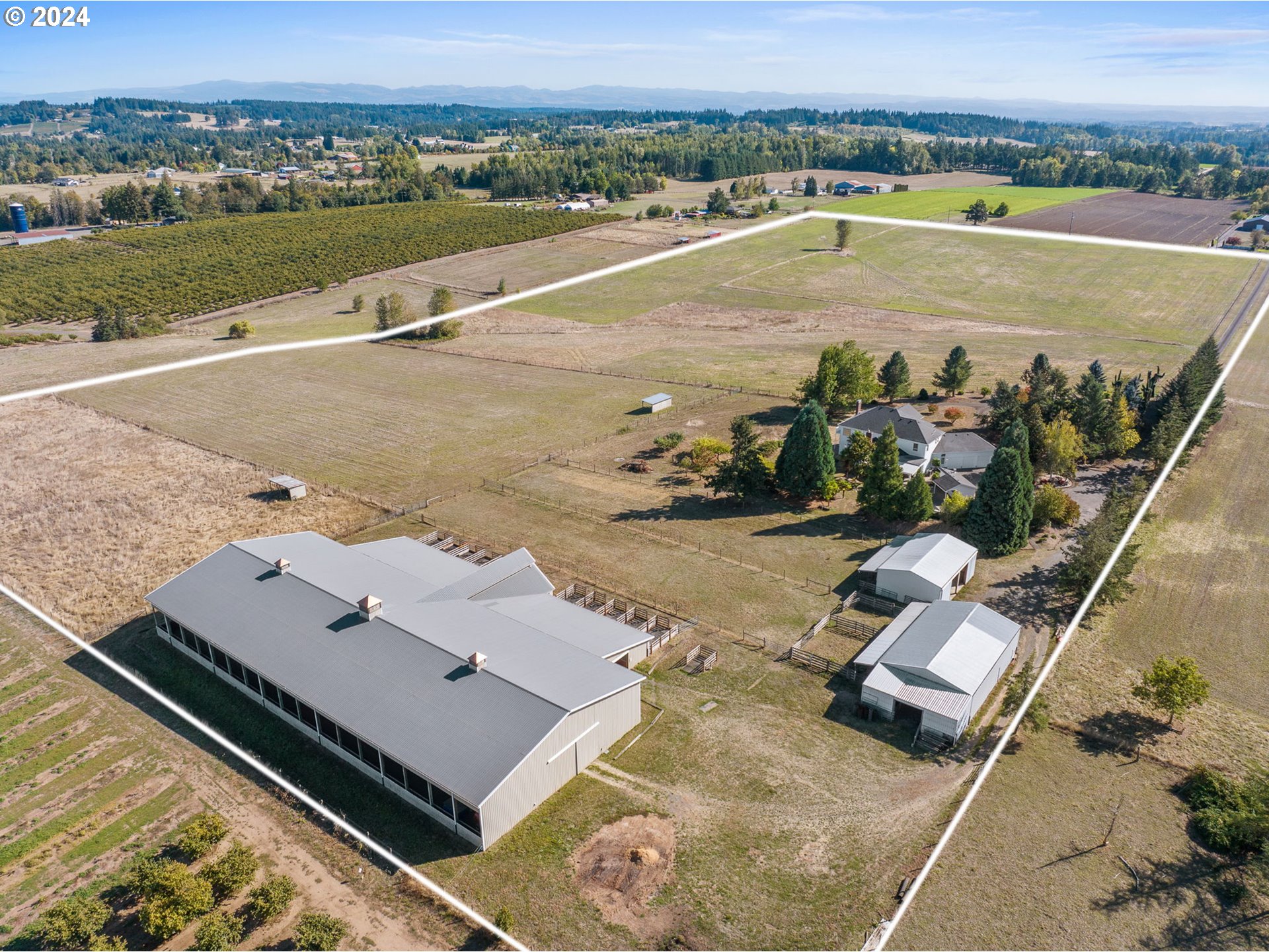 10695 South Bremer Road Canby, OR 97013 - Photo 41 of 44 an aerial view of a house with a yard
