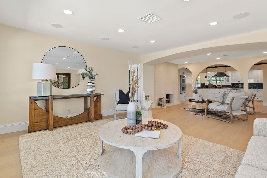9631 Fleet Road Villa Park, CA 92861 - Photo 17 of 64 a living room with furniture and a wooden floor
