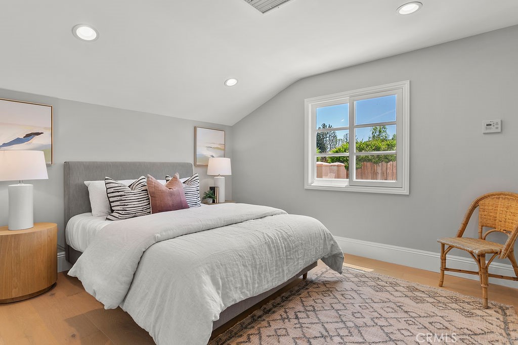 9631 Fleet Road Villa Park, CA 92861 - Photo 34 of 64 a bedroom with a bed a chair and next to a window