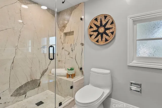 a view of swimming pool with seating space