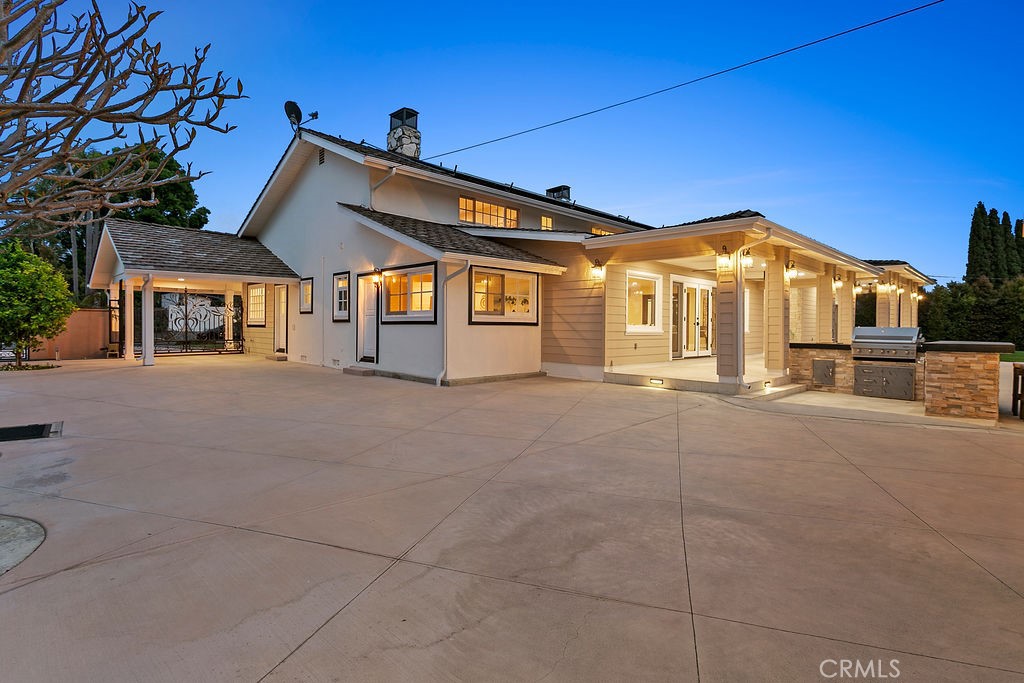 9631 Fleet Road Villa Park, CA 92861 - Photo 54 of 64 a view of a white house with a city view