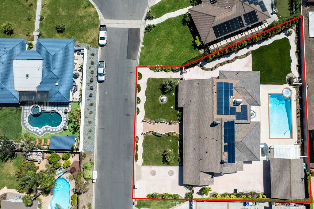 9631 Fleet Road Villa Park, CA 92861 - Photo 59 of 64 an aerial view of a house with a swimming pool and outdoor seating