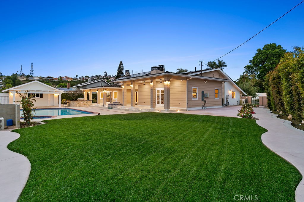 9631 Fleet Road Villa Park, CA 92861 - Photo 61 of 64 a view of an house with backyard space and garden