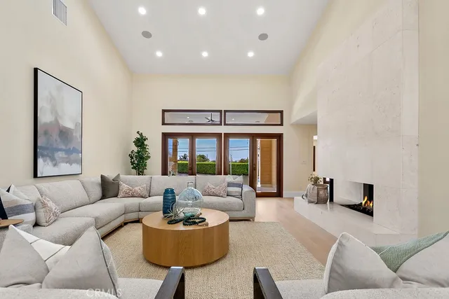 a living room with furniture and a rug