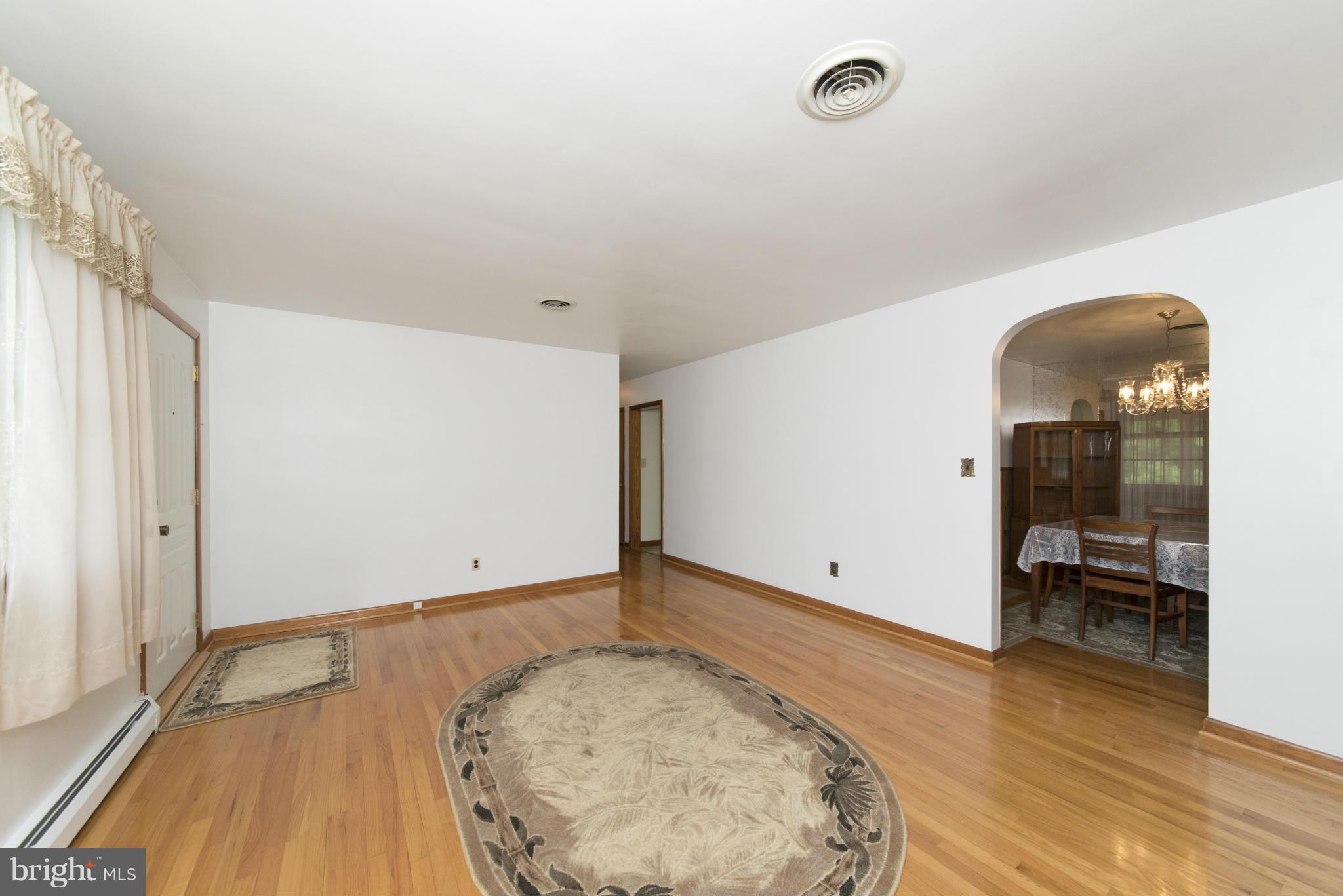 2508 Philadelphia Road Edgewood, MD 21040 - Photo 3 of 30 wooden floor in an empty room with a window