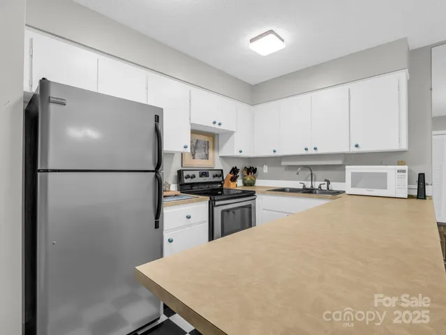 $365,000 | 140 West Lake Drive, Unit 301, Lake Lure, NC 28746