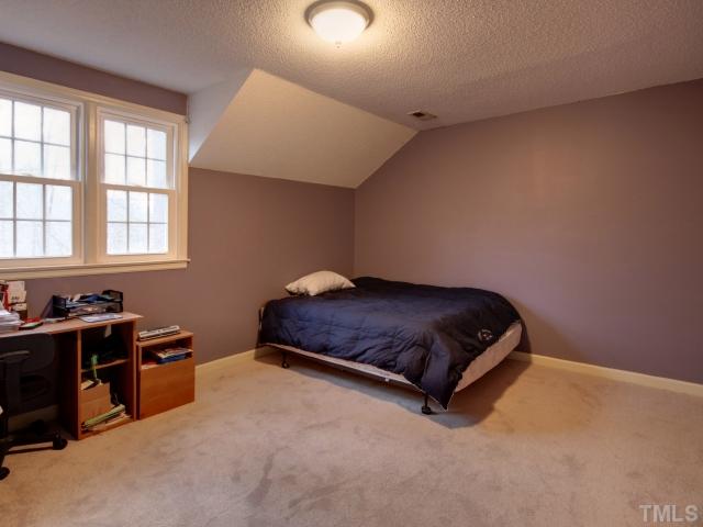 8704 Oneal Road Raleigh, NC 27613 - Photo 9 of 12 Spacious secondary bedrooms each with walk in closets.