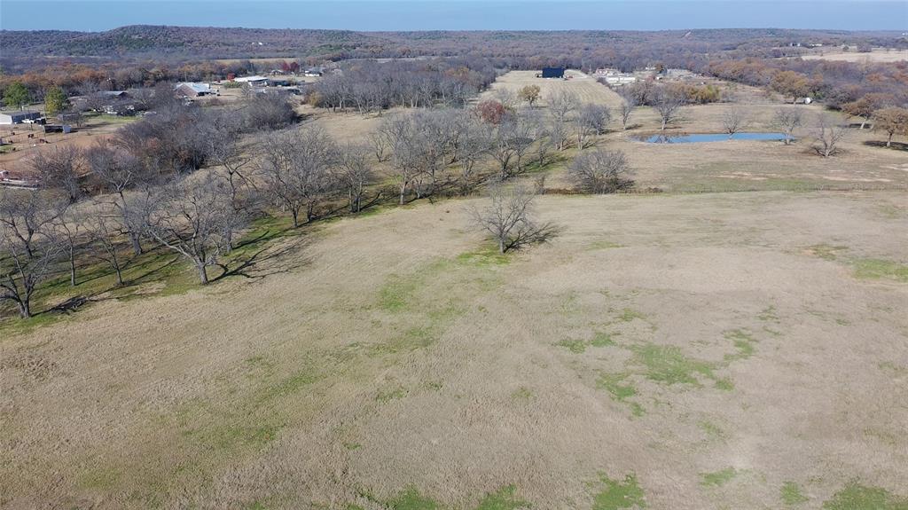 1551 Wilson Bend Road Millsap, TX 76066 - Photo 20 of 22 an aerial view of house with mountain view