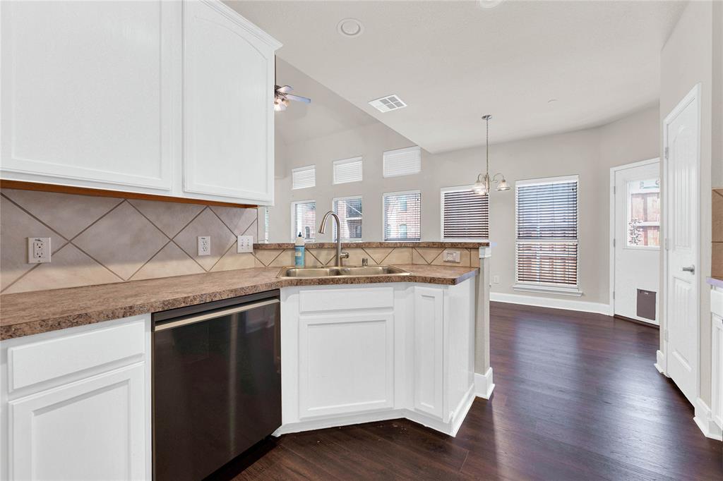 2010 Downing Street Allen, TX 75013 - Photo 14 of 29 a kitchen with a sink and cabinets