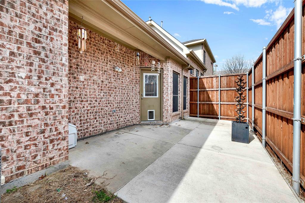 2010 Downing Street Allen, TX 75013 - Photo 23 of 29 a view of a pathway along the building