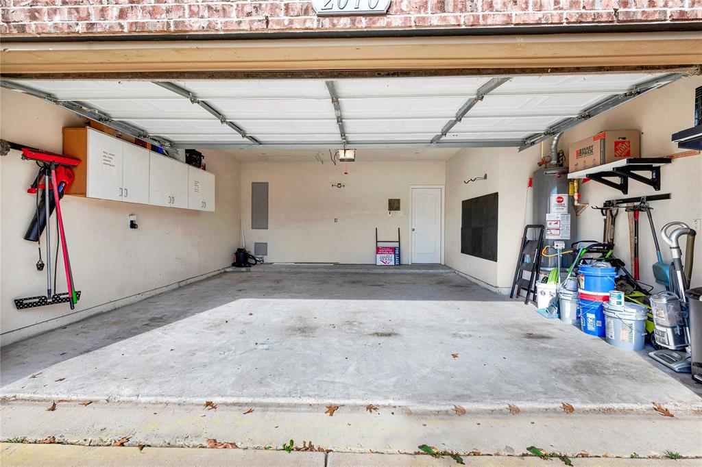 2010 Downing Street Allen, TX 75013 - Photo 25 of 29 a view of a garage
