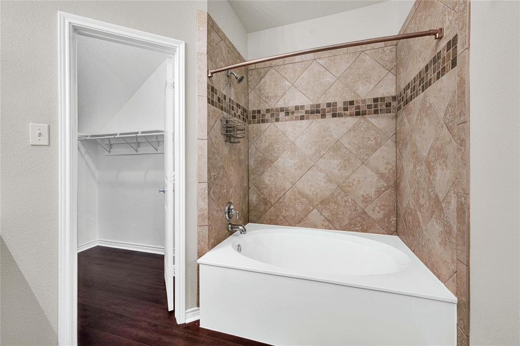 2010 Downing Street Allen, TX 75013 - Photo 5 of 29 a bathroom with a shower and a toilet
