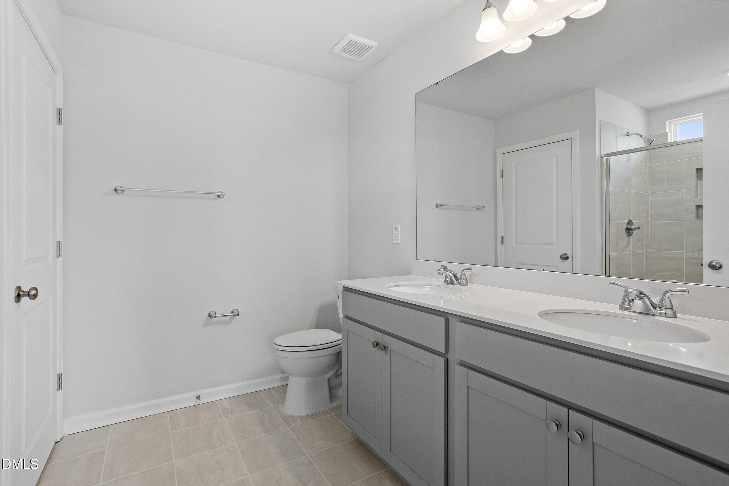 79 Osgood Street Angier, NC 27501 - Photo 21 of 31 a bathroom with a sink and a toilet