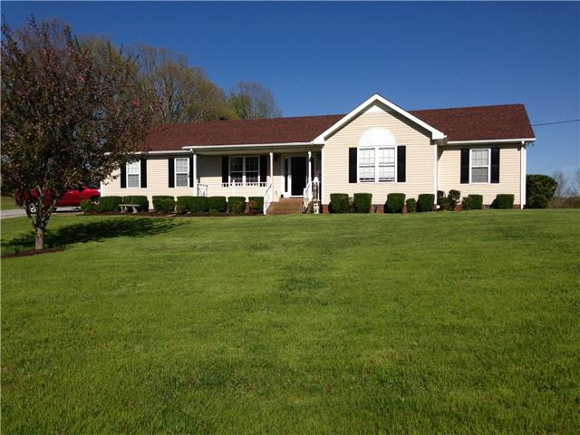 1898 Rock Church Road Charlotte, TN 37036 - Photo 1 of 16 Great curb appeal. Covered front porch. Nice landscaping. Aggregate sidewalk