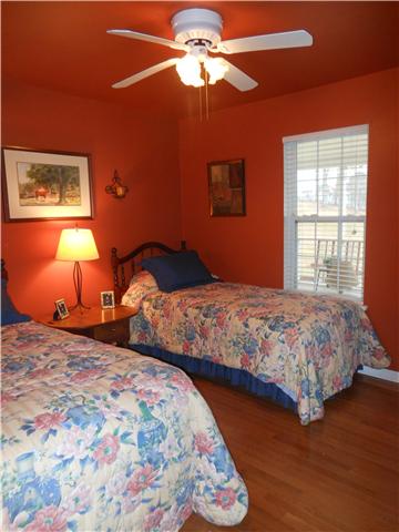 1898 Rock Church Road Charlotte, TN 37036 - Photo 11 of 16 Bedroom 2 with hardwood floors and ceiling fan