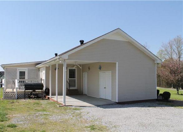 1898 Rock Church Road Charlotte, TN 37036 - Photo 14 of 16 Attached carport with workshop room and bonus room