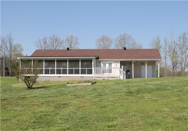 1898 Rock Church Road Charlotte, TN 37036 - Photo 3 of 16 Back deck and screened-in porch