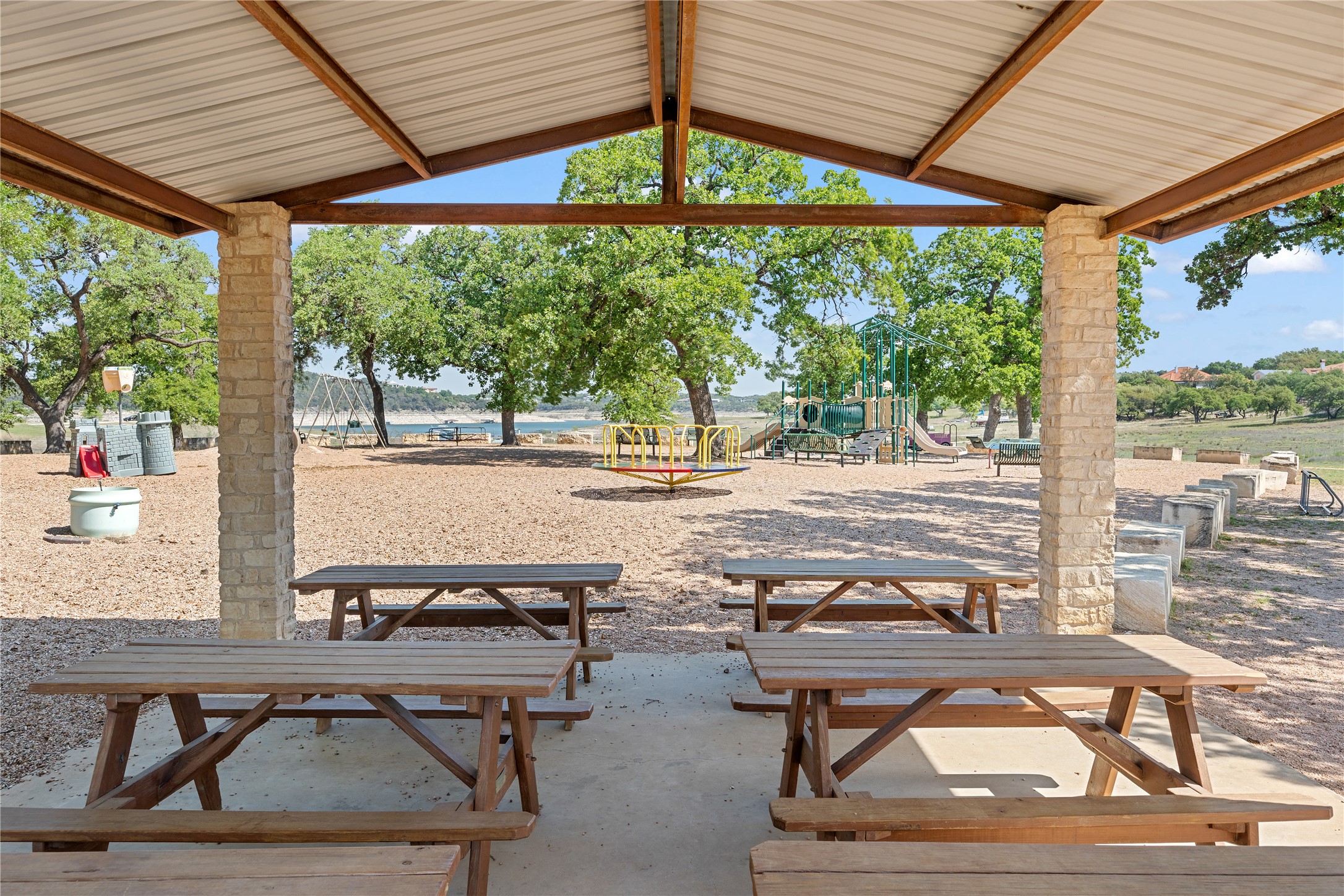 105 Summit Ridge Drive North Point Venture, TX 78645 - Photo 30 of 35 Playscape and Pavillion in private 50 acre waterfront park included. Pavillion can be rented for private use for a small fee.