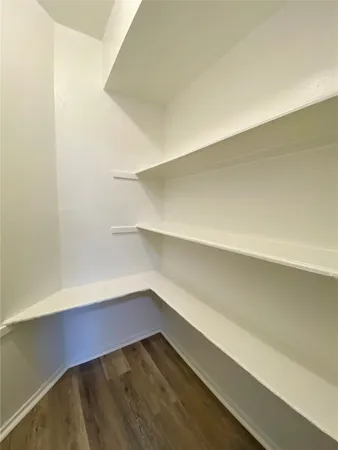 a hallway with shelf