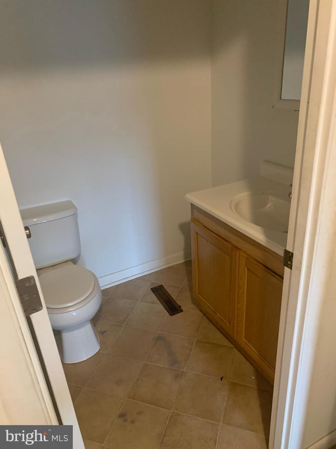 201 Timber Creek Road Clementon, NJ 08021 - Photo 22 of 22 a bathroom with a sink and a toilet