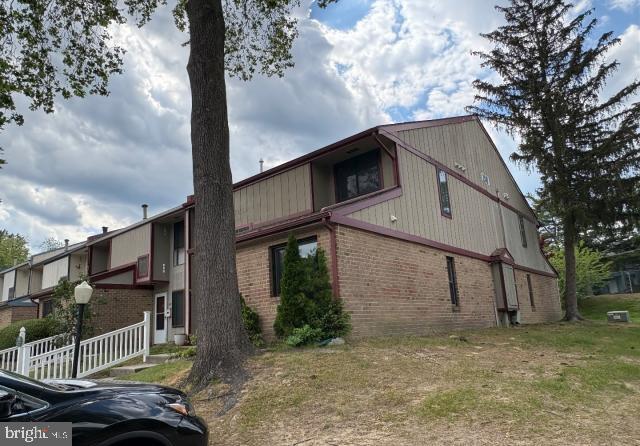 201 Timber Creek Road Clementon, NJ 08021 - Photo 3 of 22 a view of a house with a tree