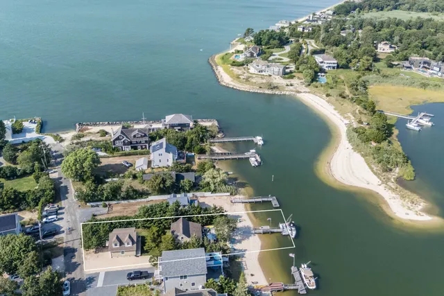 a swimming pool view with a seating space