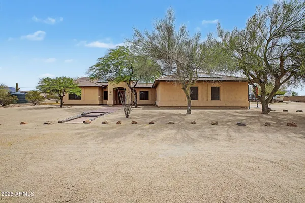 a view of a terrace with a house