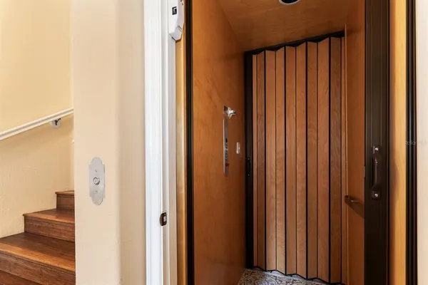 a view of a balcony with wooden floor