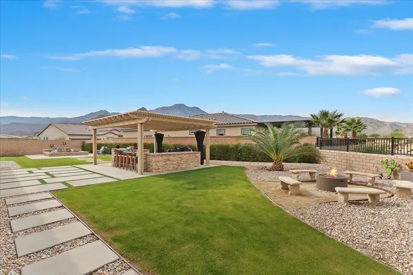 a view of a swimming pool with a patio
