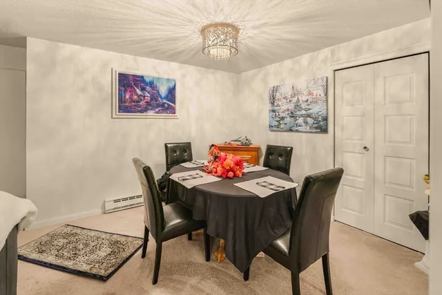 a view of a dining room with furniture