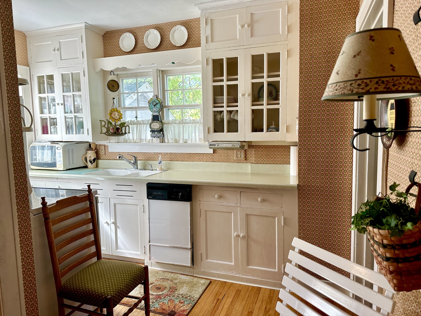 701 Chambers Street Ottawa, IL 61350 - Photo 17 of 32 a kitchen with a sink cabinets and dining table chair