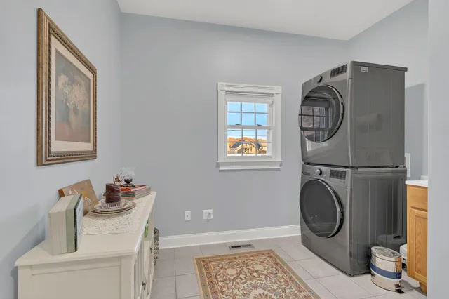 a bathroom with a toilet a sink and a mirror
