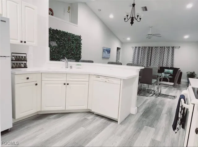 a view of kitchen with furniture and window