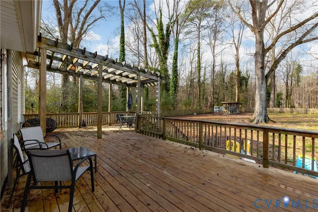 a backyard of apartments with large trees