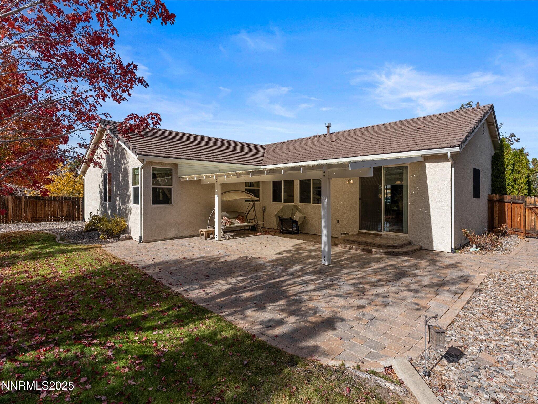 5952 Indus Drive Reno, NV 89502 - Photo 25 of 39 a view of a house with a patio