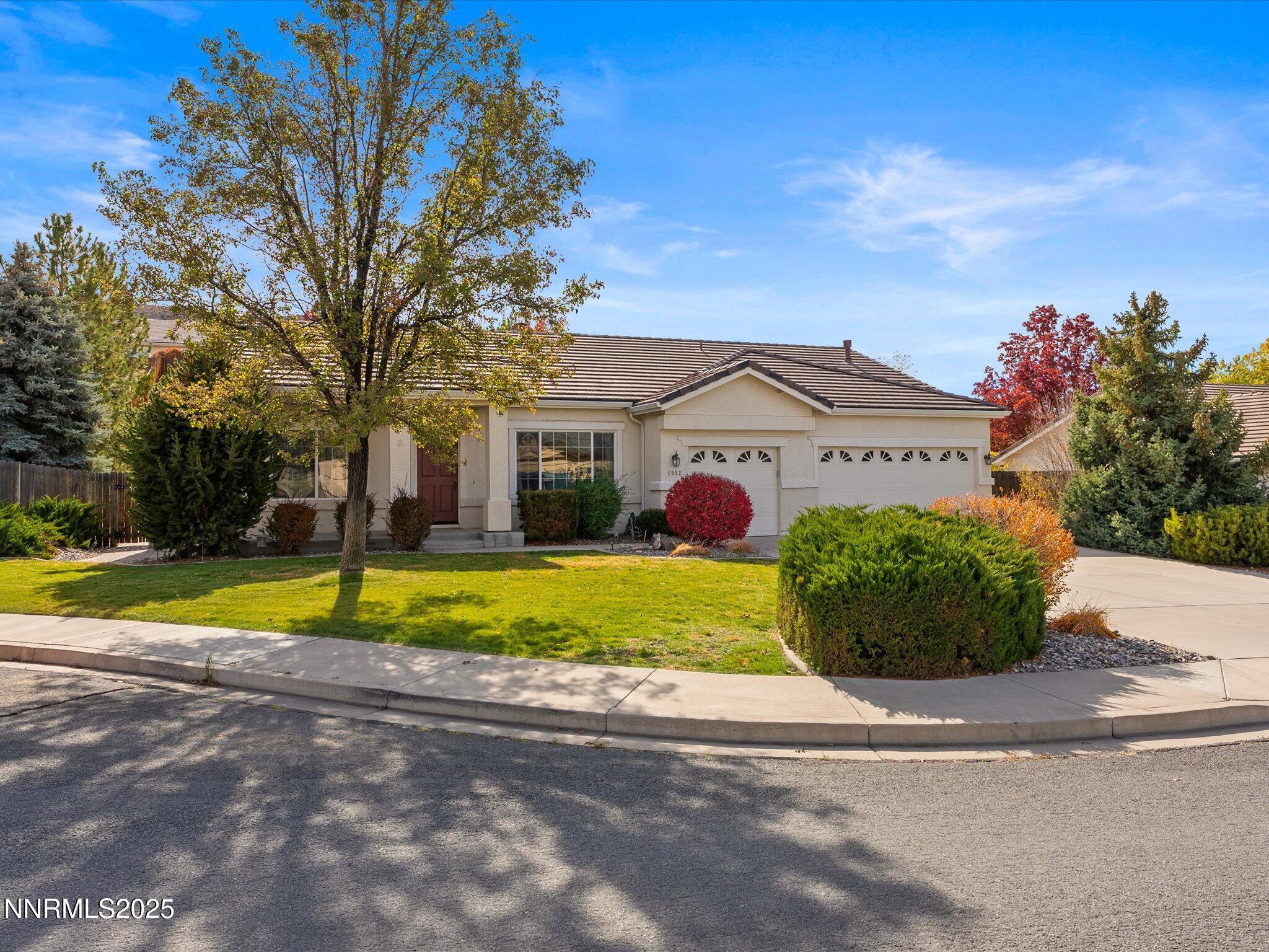 5952 Indus Drive Reno, NV 89502 - Photo 38 of 39 a view of a house with a big yard plants and large trees