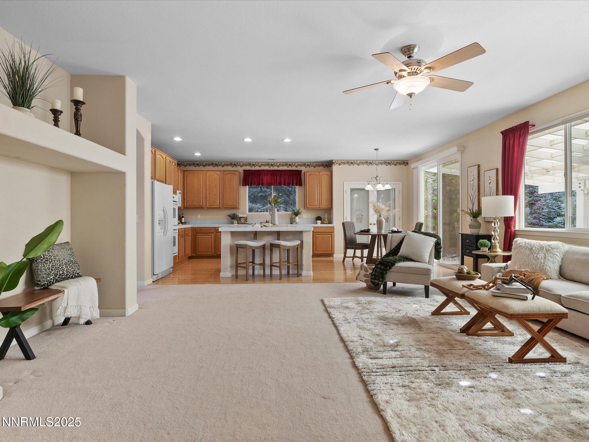 5952 Indus Drive Reno, NV 89502 - Photo 10 of 39 a living room with furniture and a large window