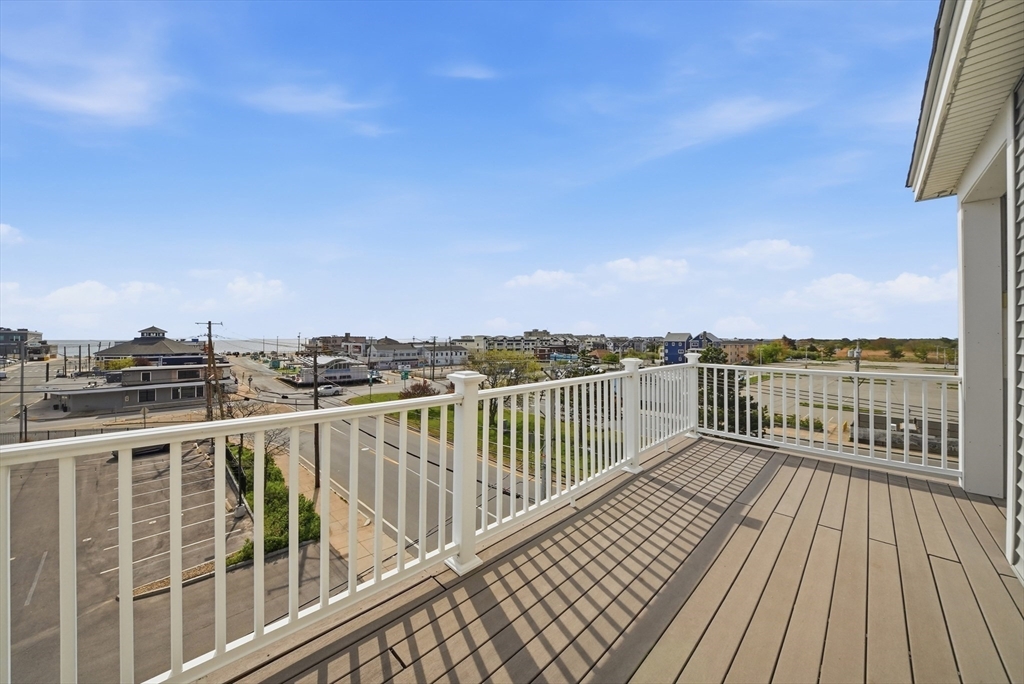 233 Beach Road, Unit A11 Salisbury, MA 01952 - Photo 30 of 37 a view of balcony with wooden floor