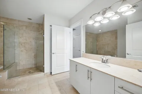 a bathroom with a shower and a toilet