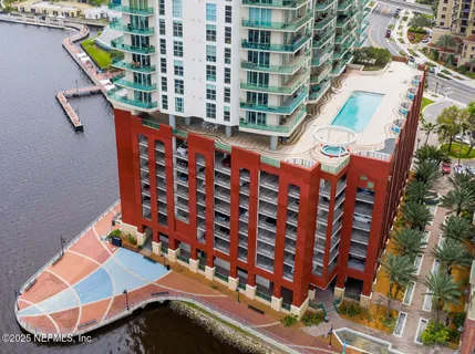a kitchen with a refrigerator and cabinets