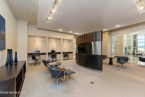 a dinning table and chairs in a room