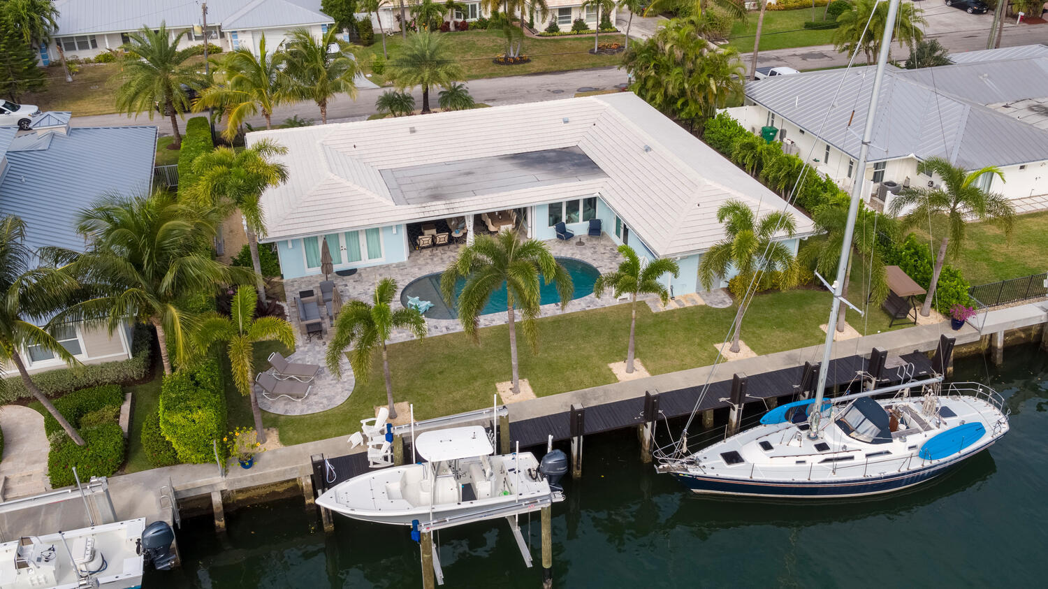 1041 Gulfstream Way Riviera Beach, FL 33404 - Photo 17 of 39 an aerial view of a house having outdoor space