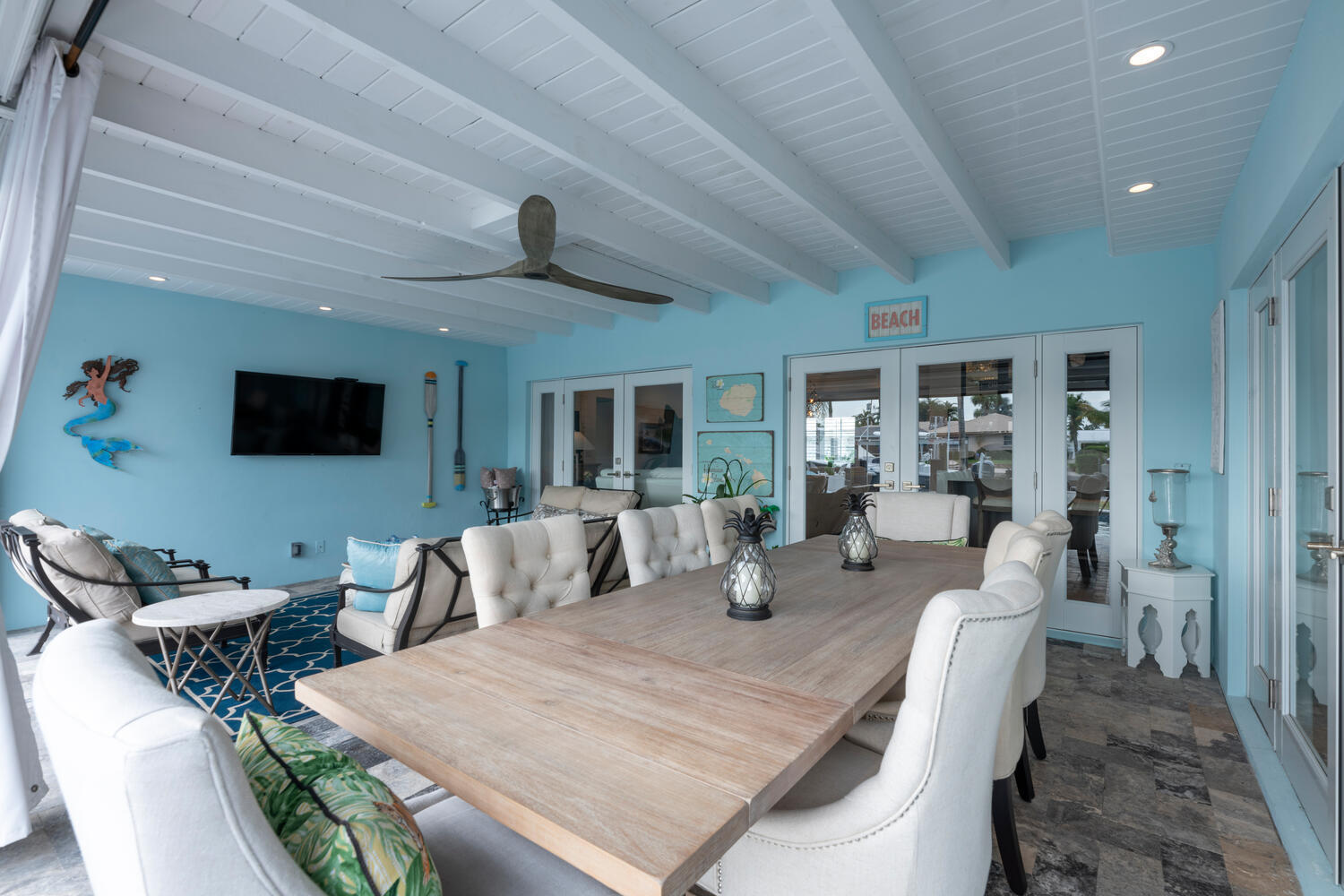 1041 Gulfstream Way Riviera Beach, FL 33404 - Photo 20 of 39 a living room with furniture and a flat screen tv