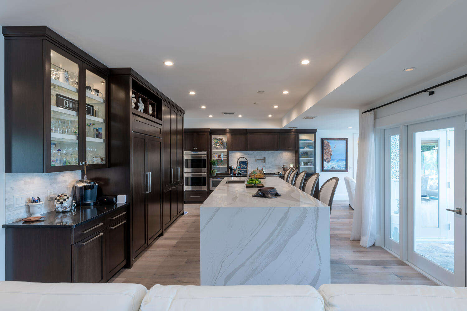 1041 Gulfstream Way Riviera Beach, FL 33404 - Photo 21 of 39 a large kitchen with stainless steel appliances kitchen island granite countertop a large counter top a refrigerator and a sink