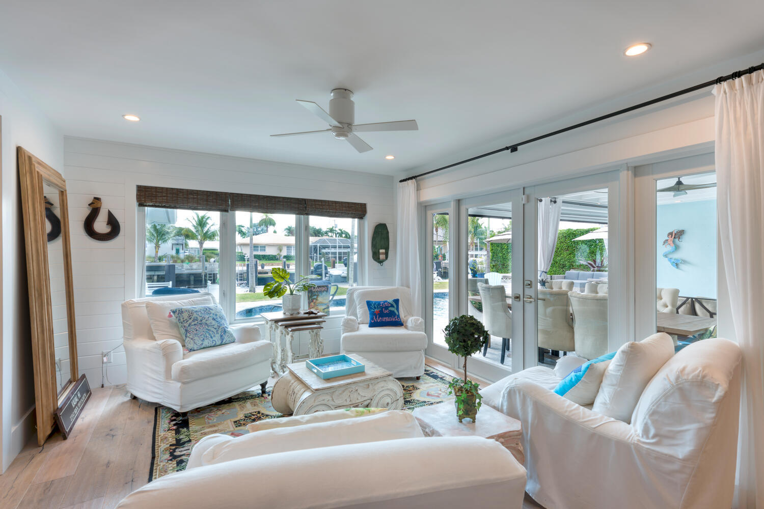 1041 Gulfstream Way Riviera Beach, FL 33404 - Photo 26 of 39 a living room with furniture and a large window